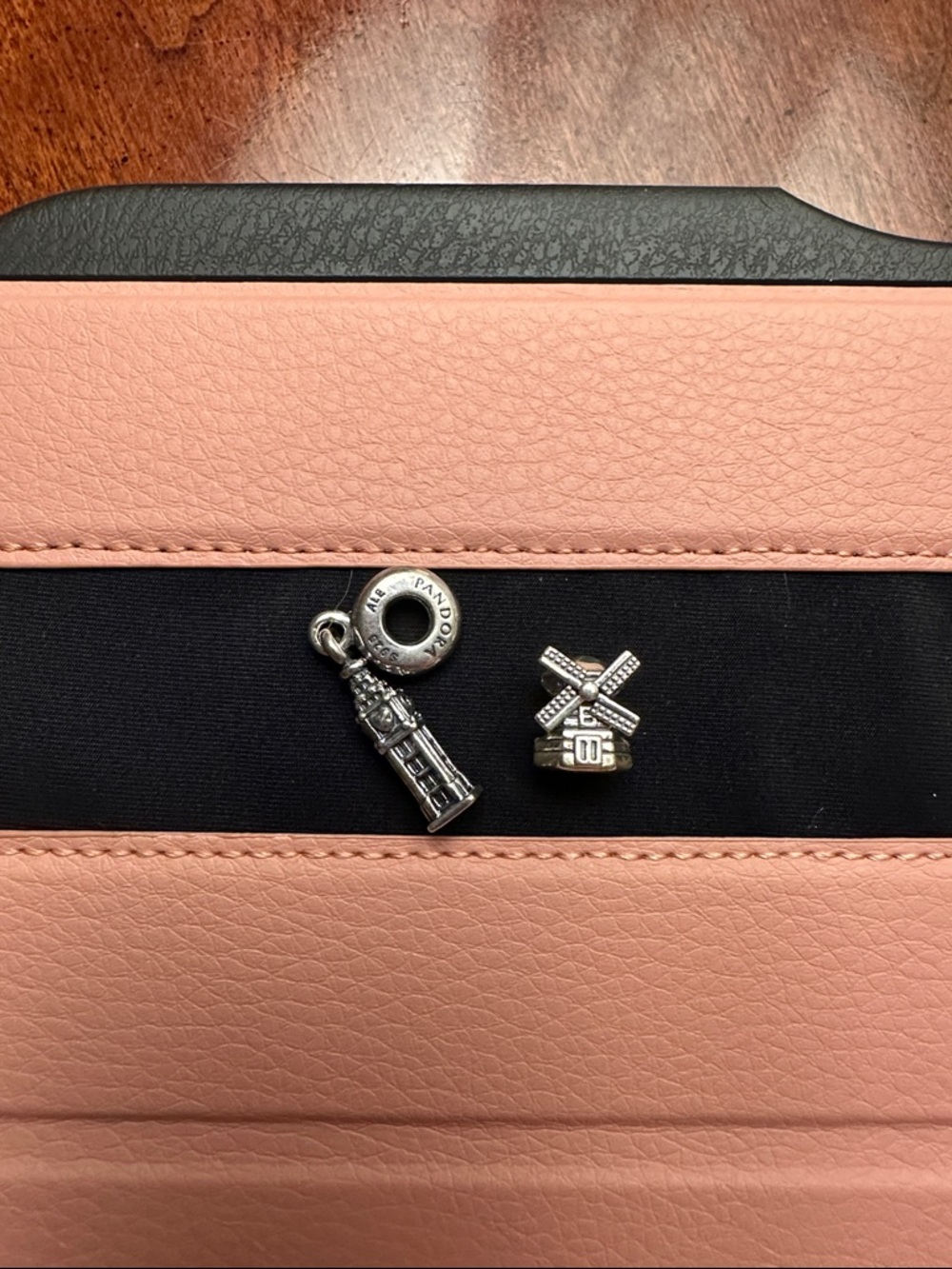 Pandora Eiffel Tower and Netherlands Windmill charms.